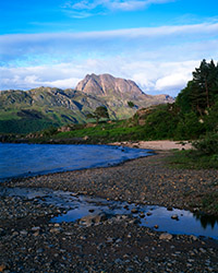 A view of Slioch across Loch Maree in soft evening light